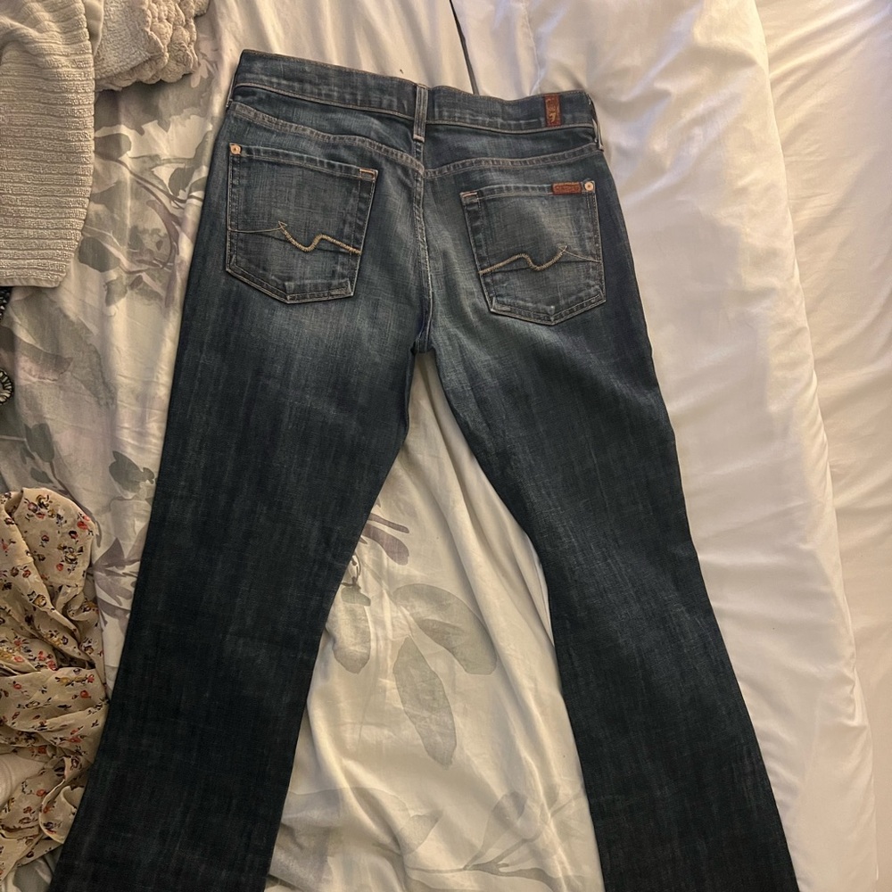 7 for all mankind bootcut jeans size 28! Has stylist knee hole,